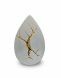 Ceramic teardrop urn for ashes 'Kintsugi' white