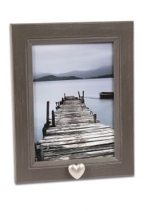 Photo frame with small heart for cremation ashes