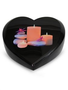 Heart urn for ashes with candles