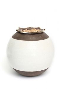 Ceramic funeral urn with silver heart