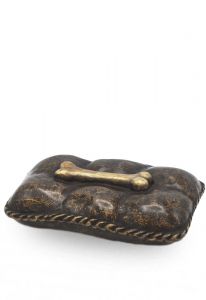 Dog urn pillow with bone made from bronze