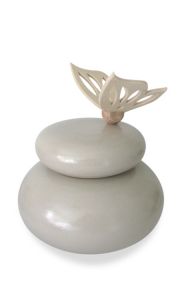 Handmade ivory white ceramic funeral urn with wooden butterfly