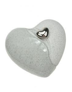 Ceramic heart shaped urn with magnetic heart