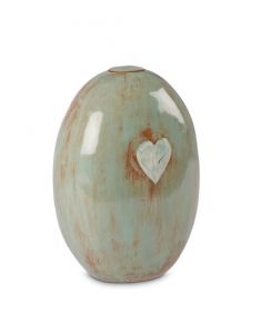 Ceramic cremation urn for ashes with heart sea green