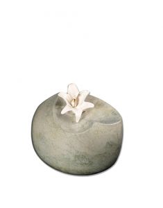 Ceramic funeral urn with lily
