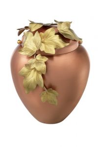 Copper cremation urn with leaves