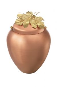 Copper cremation urn with maple leaves