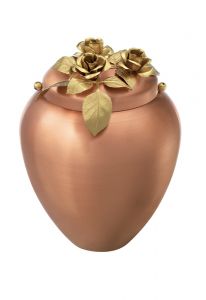Copper cremation urn with three roses