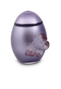 Lavender blue colored glass keepsake urn with butterfly