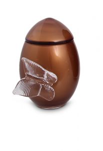 Rusty brown colored glass keepsake urn with butterfly