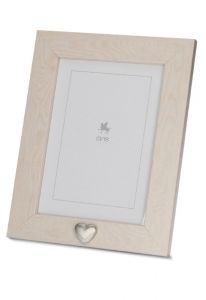 Photo frame urn with small silver heart for ashes