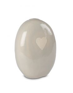 Ceramic cremation urn for ashes with heart light green