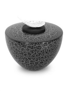 Fiberglass cremation urn for ashes with feather