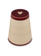 Ceramic funeral urn with silver heart